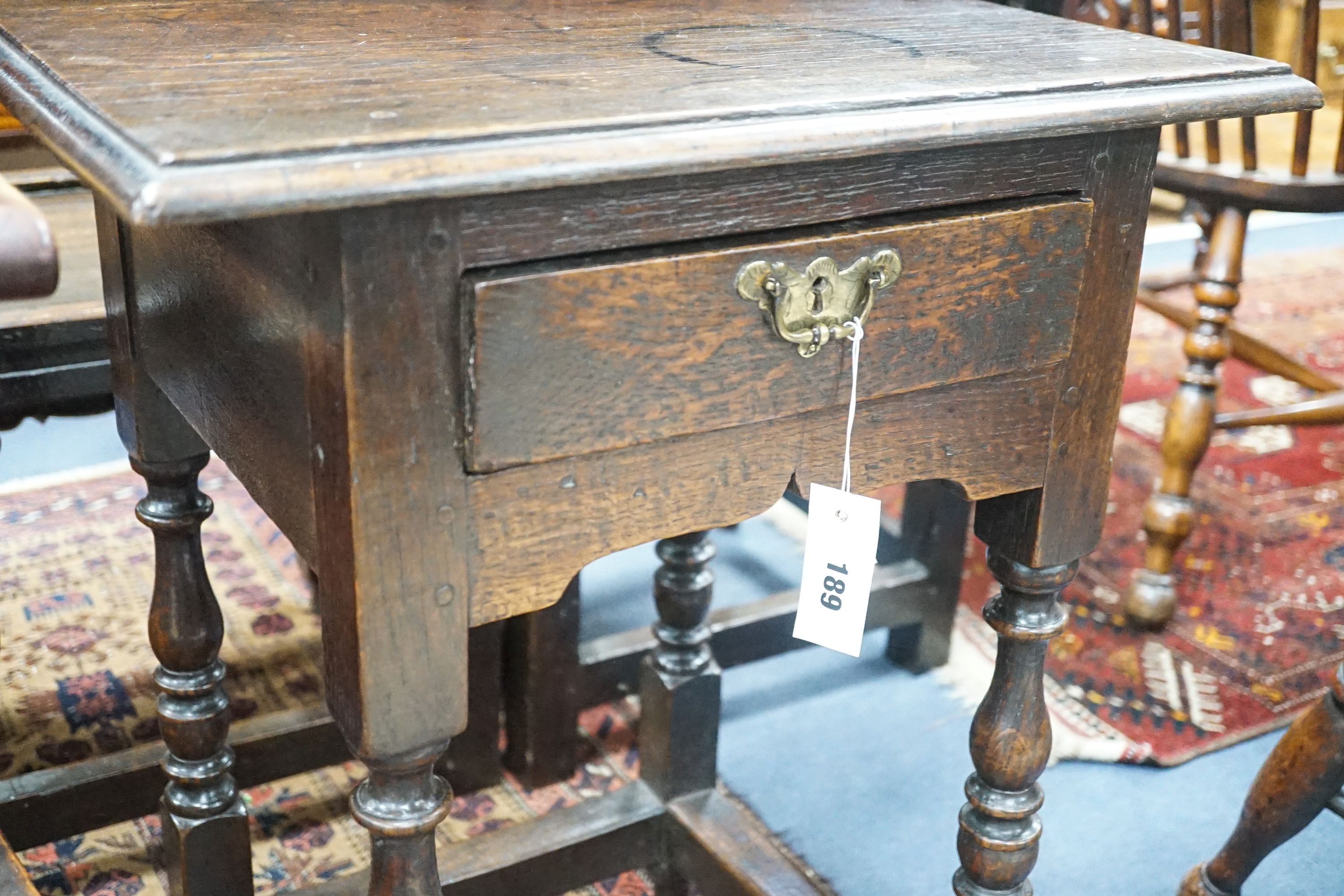 A small William and Mary rectangular oak side table on baluster turned legs, width 51cm, depth 41cm, height 69cm